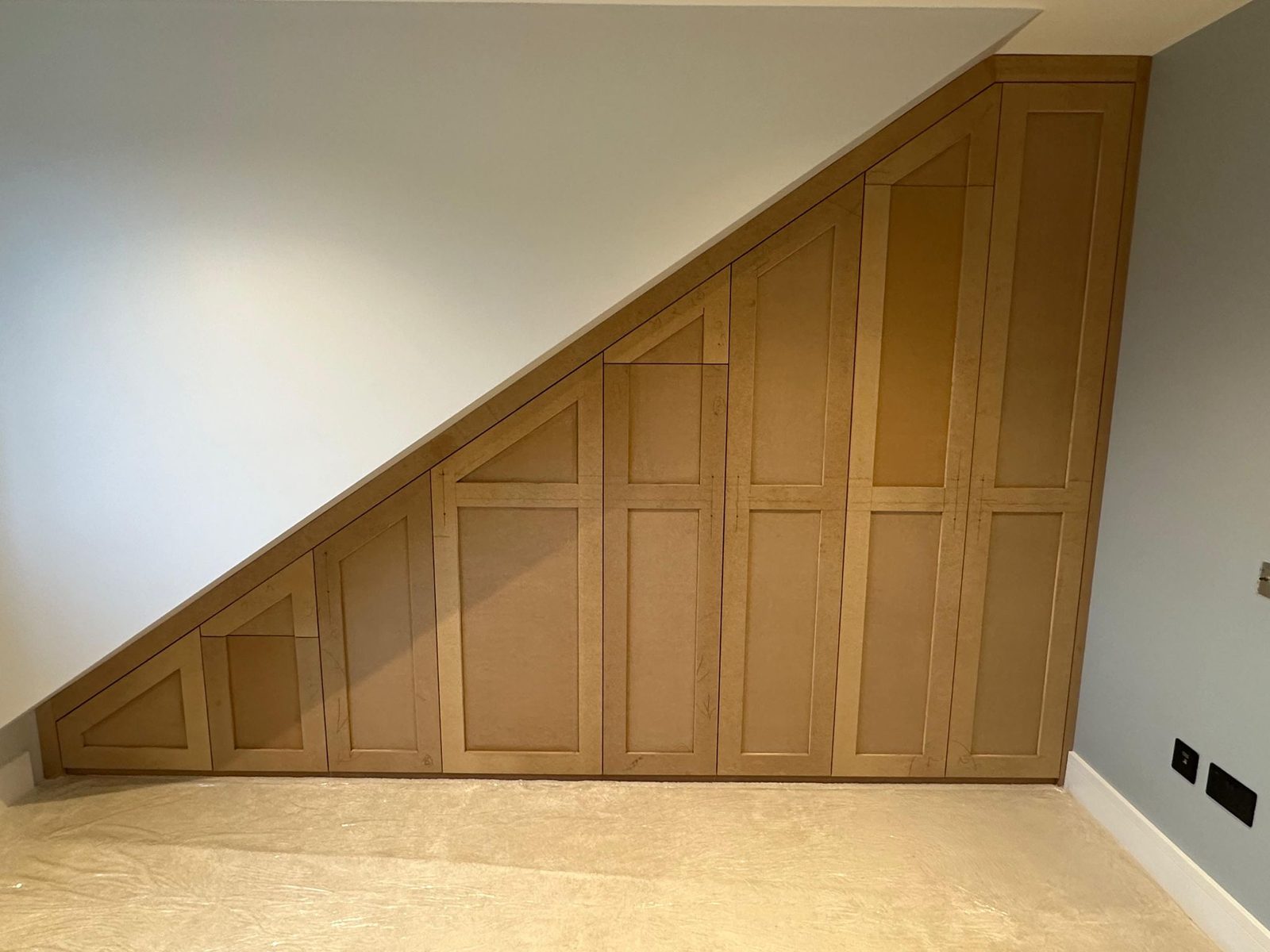Bespoke fitted joinery in the eaves