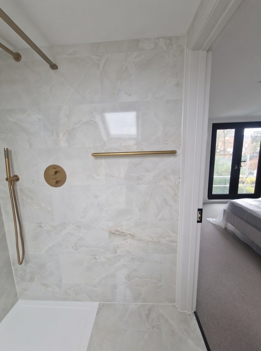 Shower with view through to the bedroom
